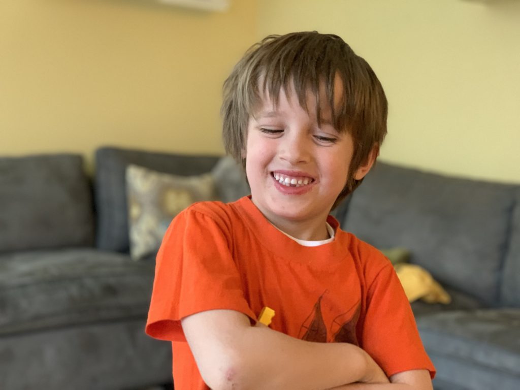 Max with a hole where his first baby tooth has fled