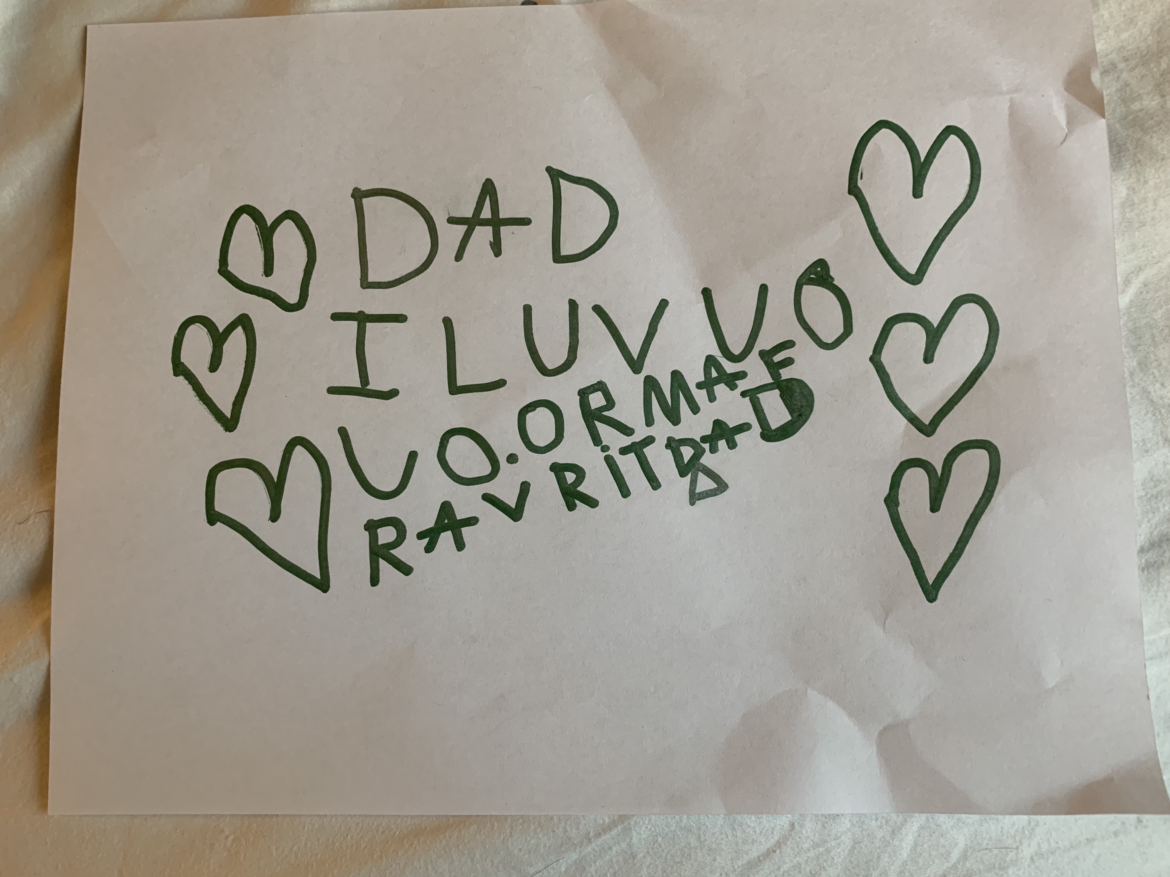 Hearts next to  atrociously spelled â€œDad I love you you are my favoriteâ€œ