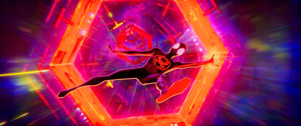 still from across the spider-verse of      Miles jumping through a portal
